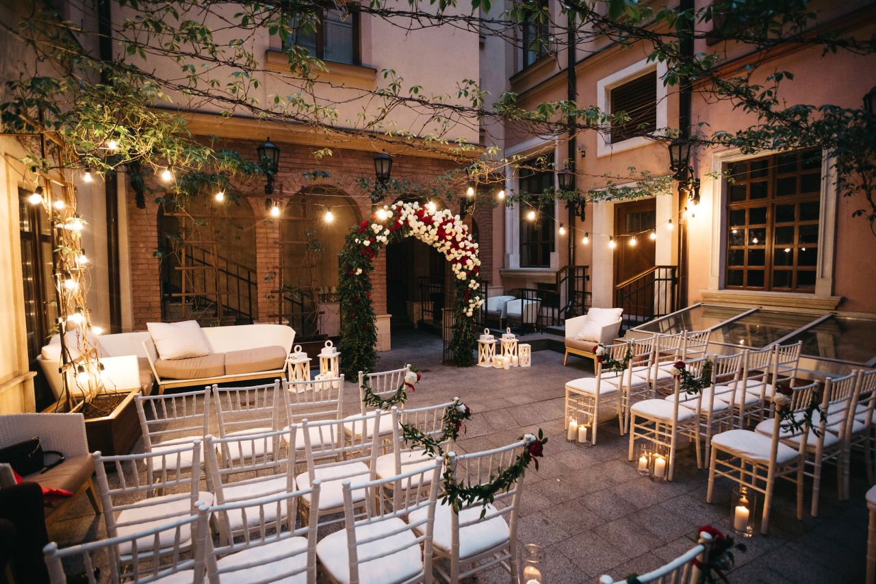 wedding venues near me with romantic lighting and outdoor courtyard ceremony space